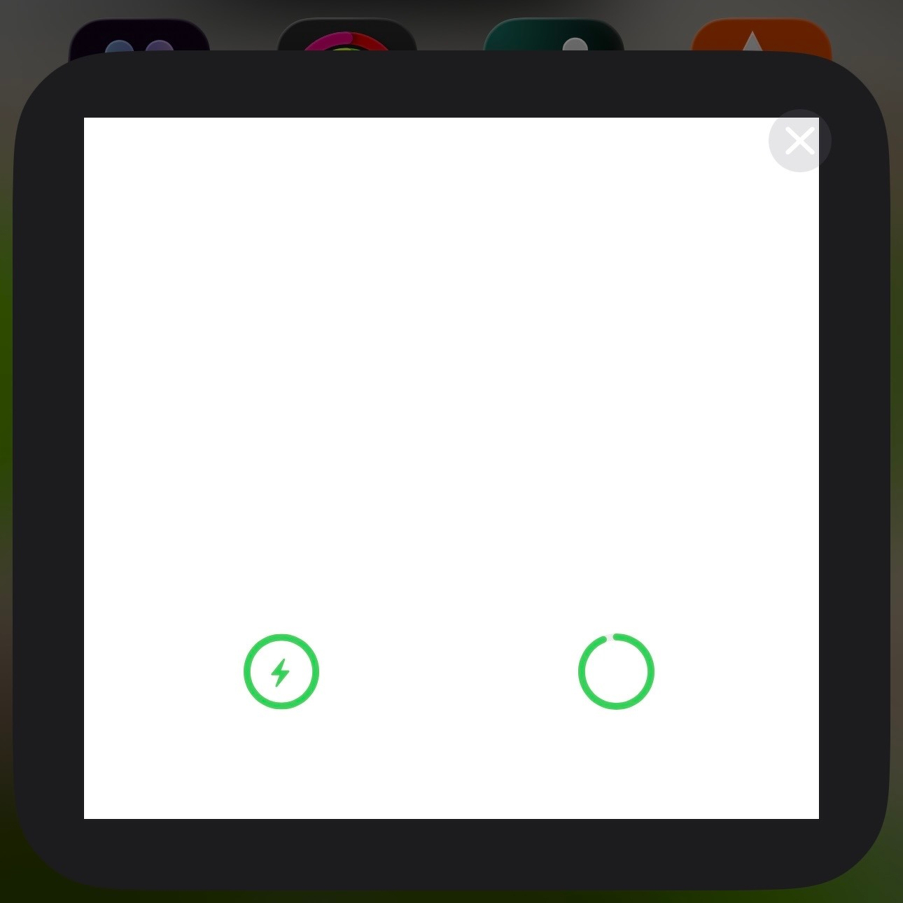The AirPods pairing sheet, except content is missing and most of the window is all white. Two unlabeled green icons float above it.